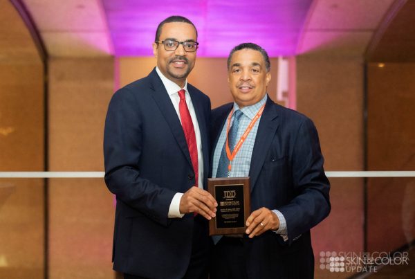 ndrew Alexis receiving JDD award for Innovations in Dermatology from Skin of Color Update