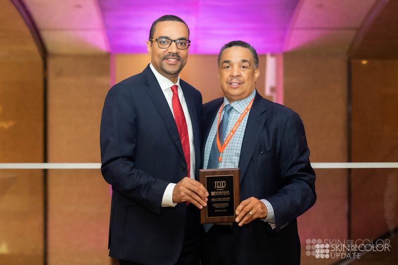 ndrew Alexis receiving JDD award for Innovations in Dermatology from Skin of Color Update